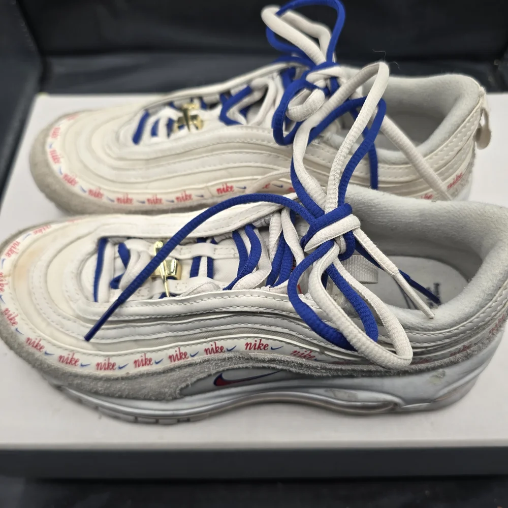 Nike White and Blue Sneakers with Red‎ Accents